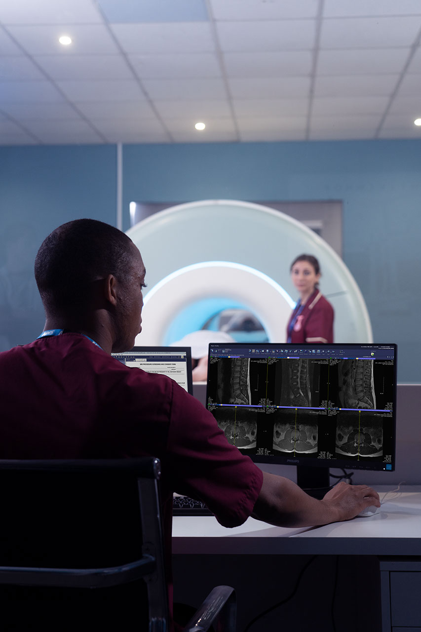 Doctor reviewing MRI scans
